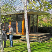 This project involved the design of a free-standing studio within a beautiful garden with established trees.It was designed as a single space, articulated by raked ceiling and windows, a split floor level and seemingly floating joinery. The full-height windows surround the space taking in garden views and abundant natural light.The studio is fully self-contained with a kichenette and bathroom. It is also integrated with a new carport and garden shed.